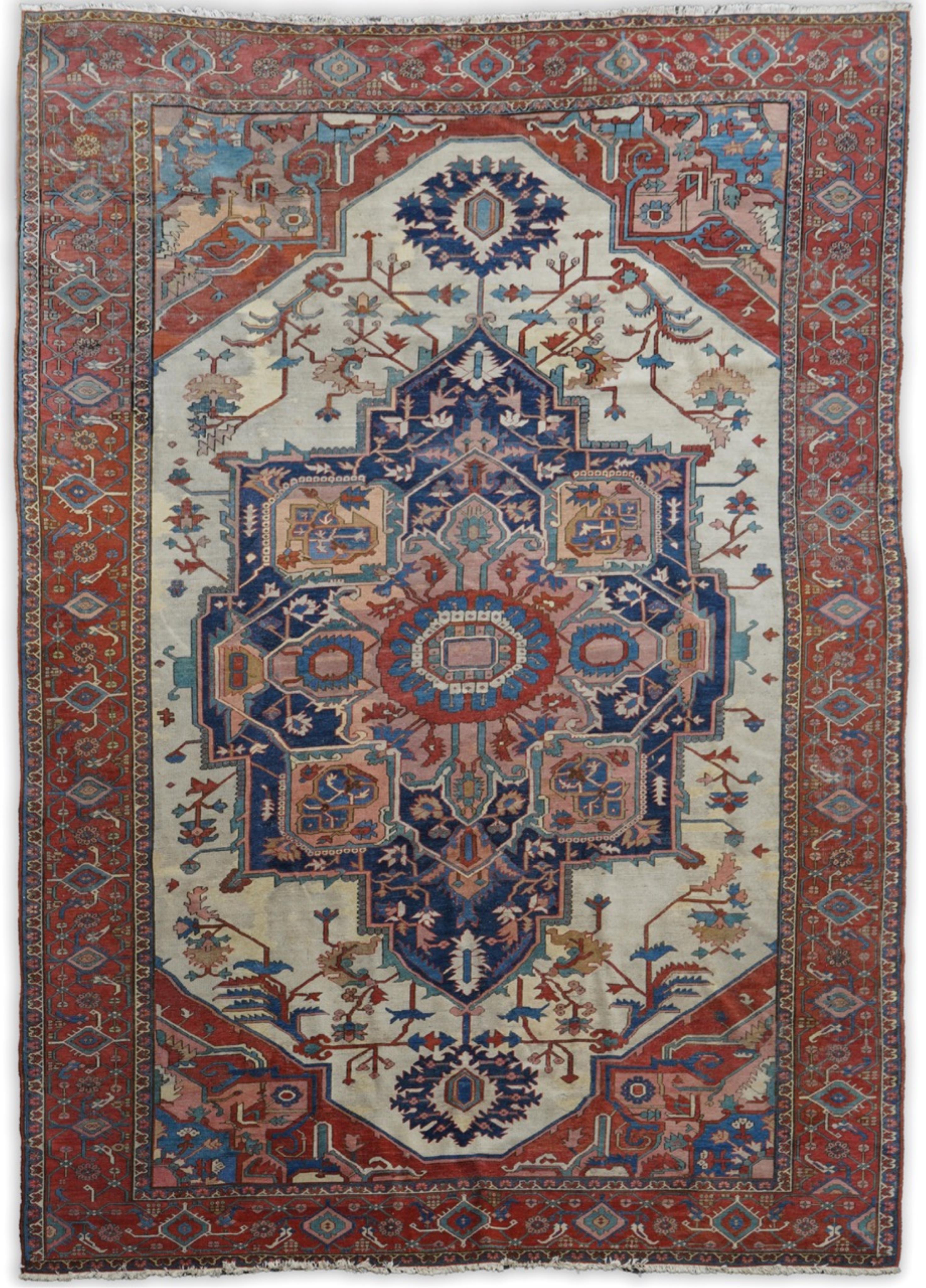 An early 20th century Heriz ivory ground carpet